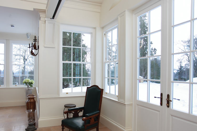 heritage sash windows with a snowy view outside