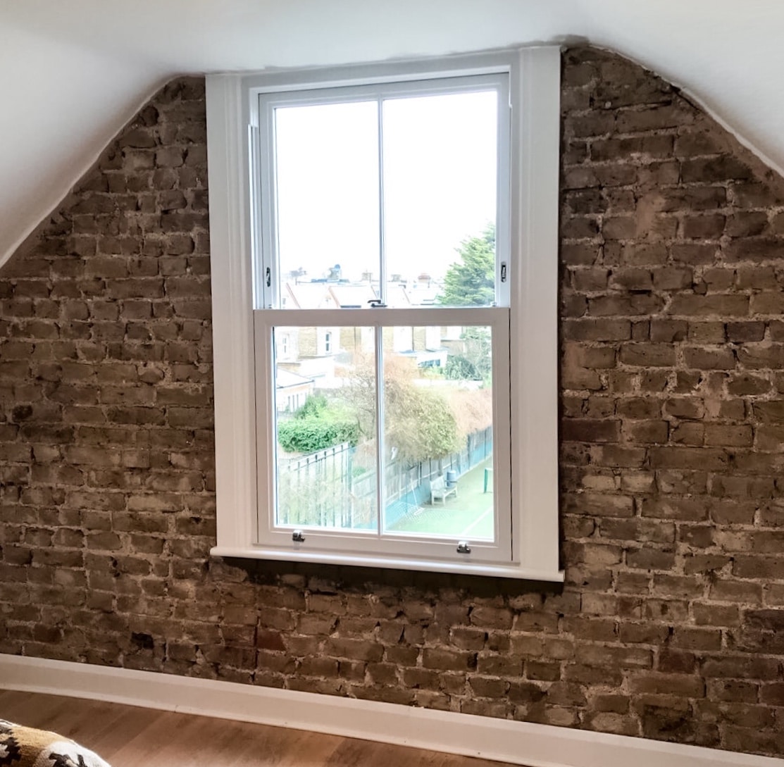 a heritage sash window in an attic conversion