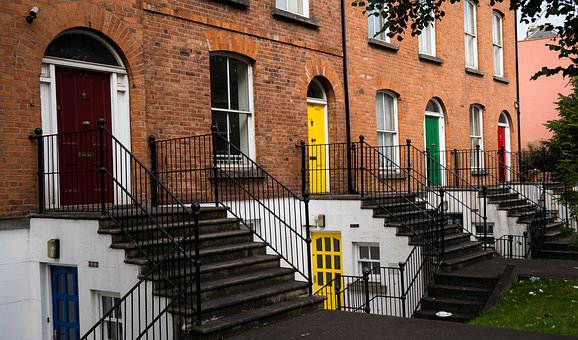 a roa row of red brick terraced houses