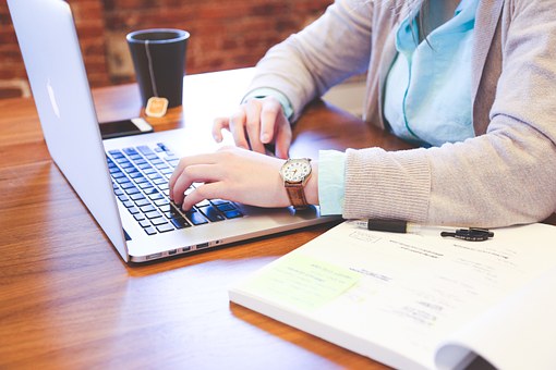 A person doing research at her desk