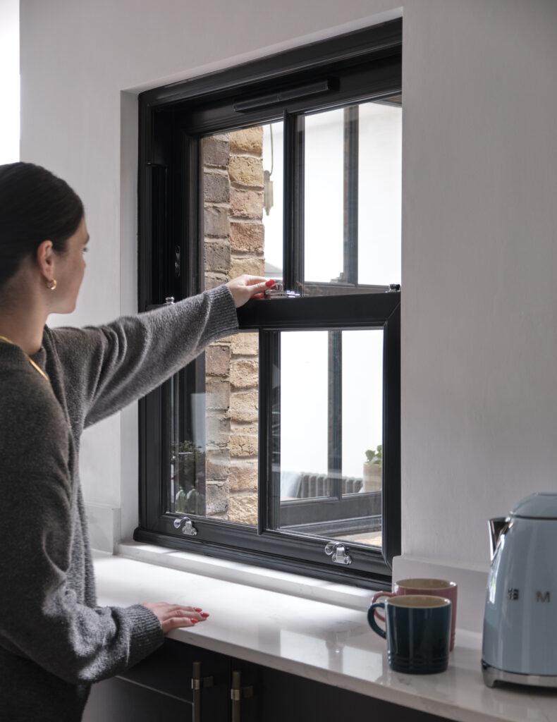 Black Contemporary PVCu Sash Window In Kitchen