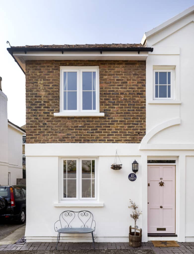 Timber Casement Windows And Pink Front Door